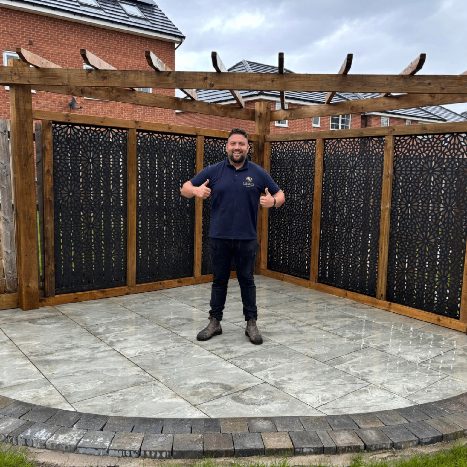 Timber pergola over a garden seating area